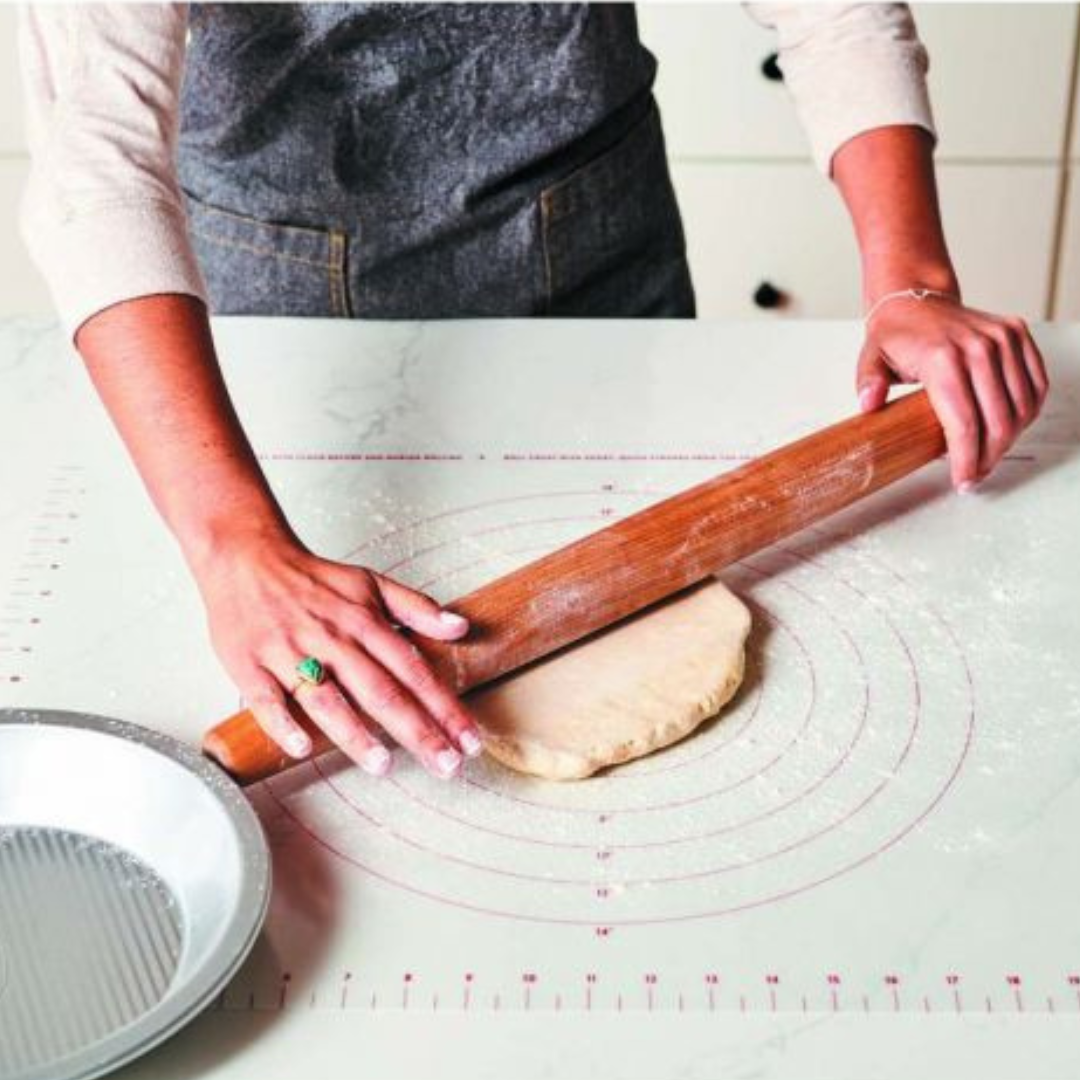 Bake like a pro with the King Arthur Silicone Rolling Mat! Non-stick, non-slip surface, size markings, heat-safe up to 500°F. Easy to clean in dishwasher.