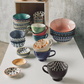 Collection of Danica Stamped Latte Mugs and Bowls