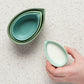 Stoneware set of 4 measuring cups that comes in a giftable box! Comes with 1/4 cup, 1/3 cup, 1/2 cup, and 1 cup green ombre stoneware measuring cups.