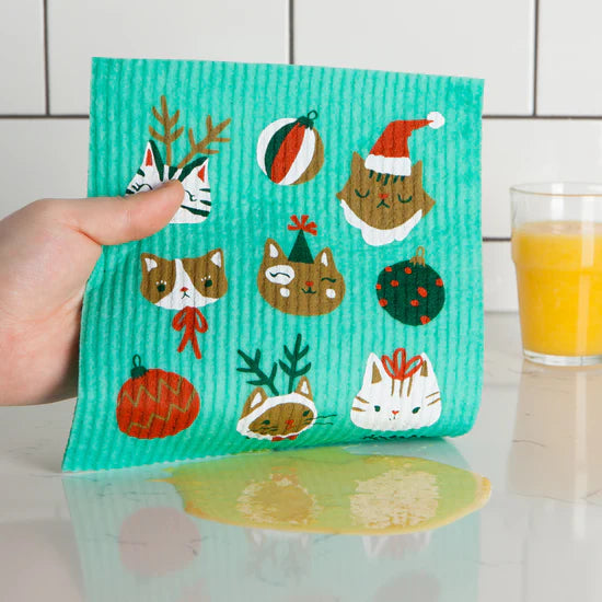 Let the charm of a playful clowder of cats spice up your cleaning routine with the Let it Meow Swedish Sponge Cloth by Ecologie! 