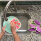 Our Lilacs tea towel is sure to freshen up your kitchen and brighten your everyday. All of The Neighborgoods dish towels add a bright pop of color to your kitchen.  Made from 100% flour sack cotton, our lilacs dish towel and will only get softer and more absorbent over the years in your kitchen. This generously sized dish towel can handle small and big tasks in the kitchen as well as household chores.