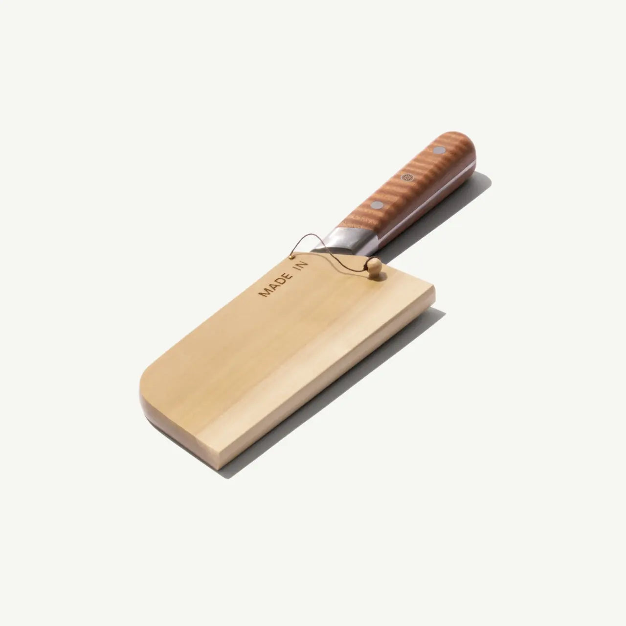 Wooden cleaver with a brown handle on a white background
