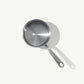 A stainless steel saucepan with a long handle, set against a white background.