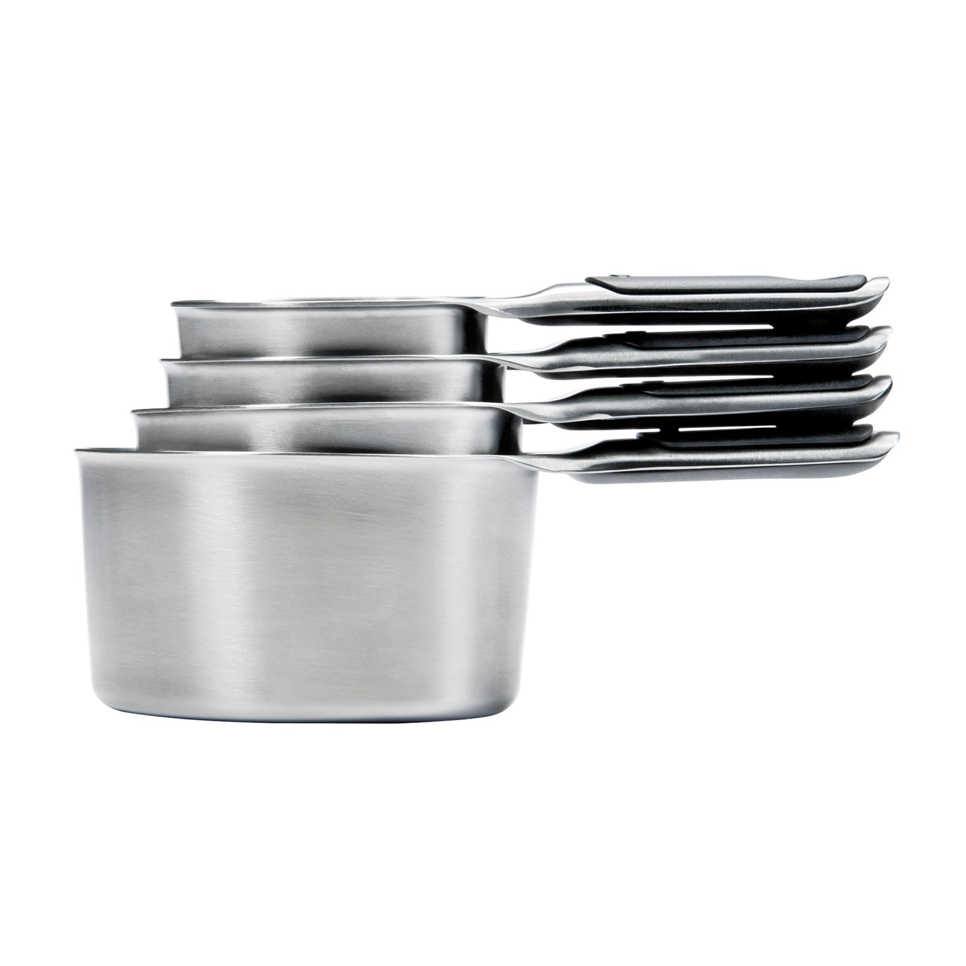 A set of four nested stainless steel measuring cups with handles, shown on a plain white background.