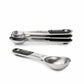 Set of metal measuring spoons stacked together. 