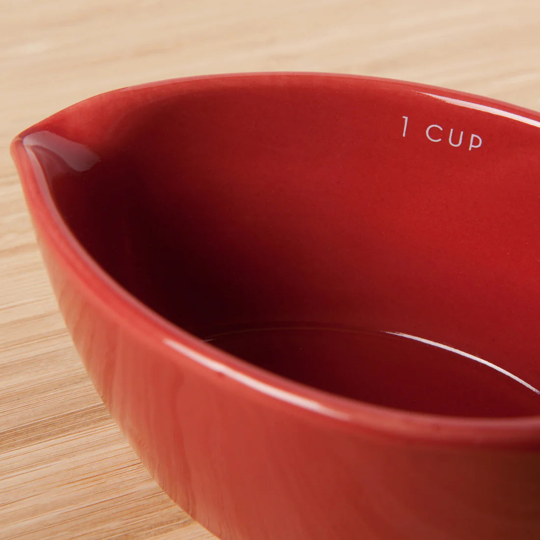 Set of 4 Danica Canyon measuring cup set made of stoneware. Comes in 1 cup, 2/3 cup, 1/3 cup and 1/4 cup.