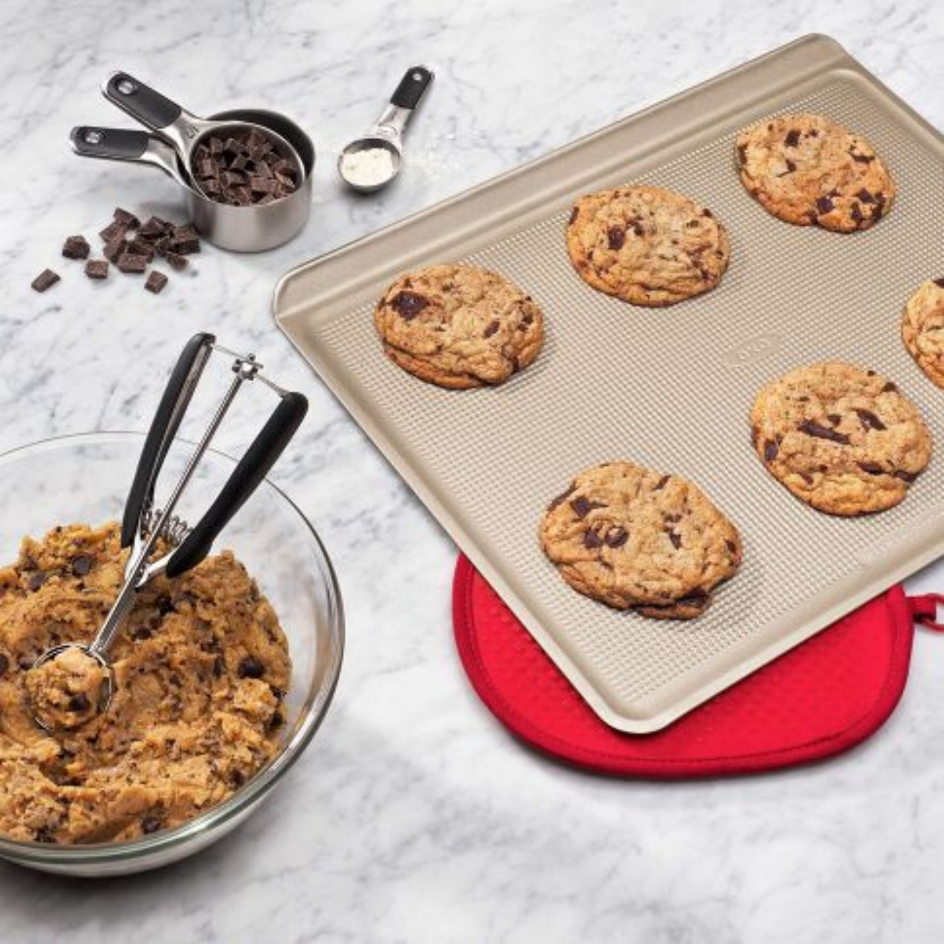 Say hello to cookie perfection with our Medium Cookie Scoop! This nifty size 40 portioner is your ticket to cookie consistency heaven, dishing out exactly 1.5 tablespoons of dough with each scoop.