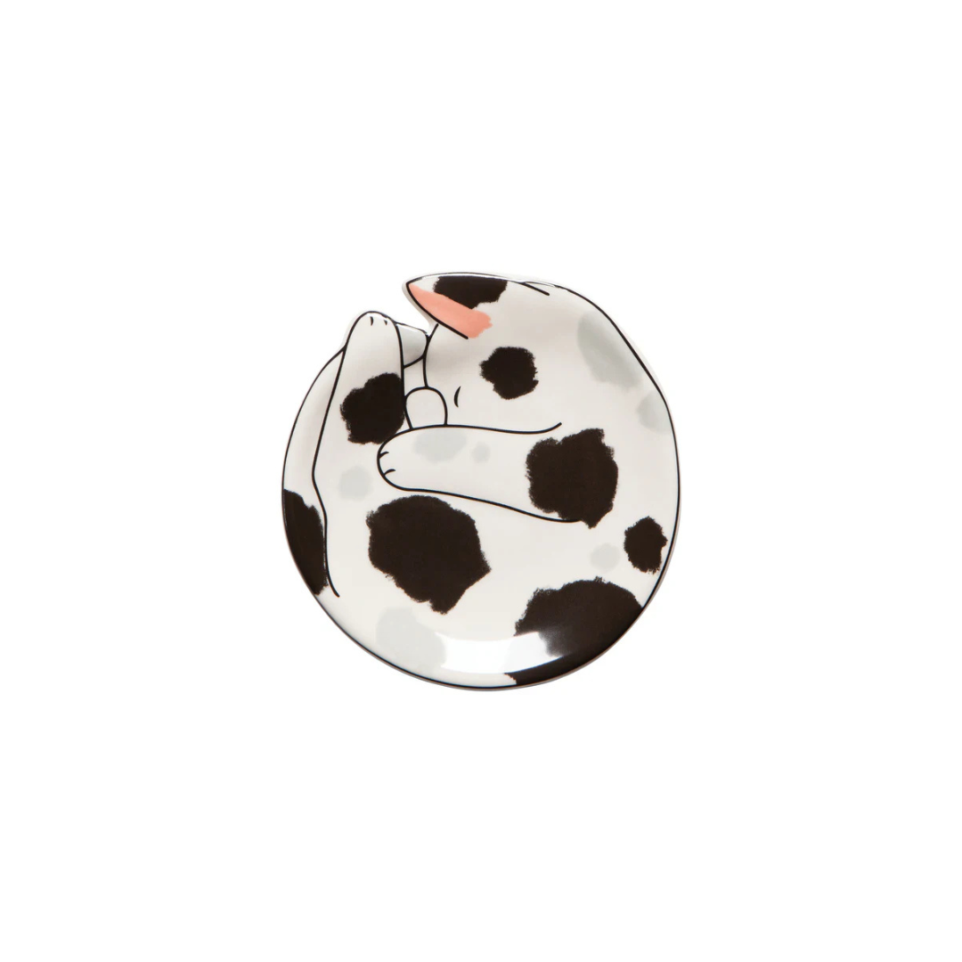 Add a touch of feline charm to your home with the Meow and Furever Trinket Tray in Spots. Crafted from durable, food-safe New Bone China, this adorable tray features a white cat with black stripes, making it a delightful accent for any decor. 