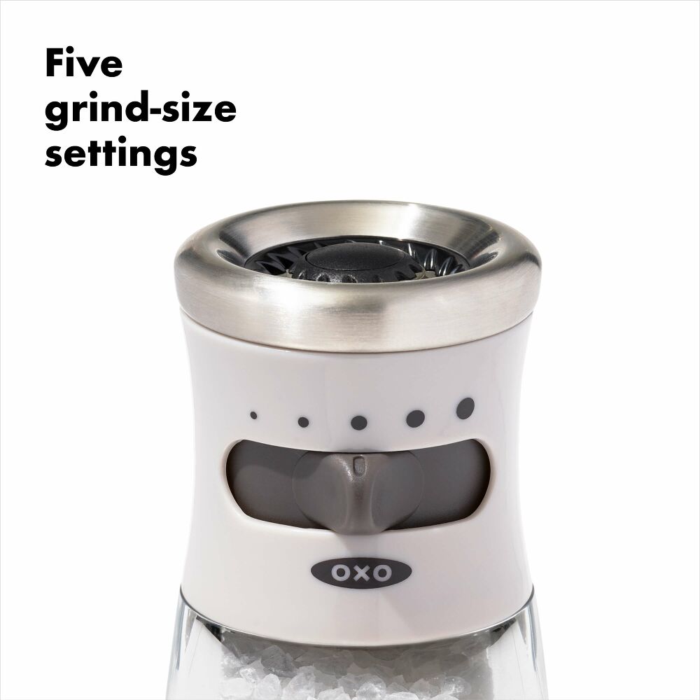 Close up of five grind size settings of salt grinder. 