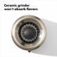 Close up of ceramic grinder on salt grinder. 
