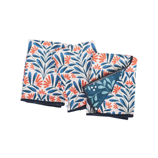 three folded fabric towels with a floral pattern on a white background