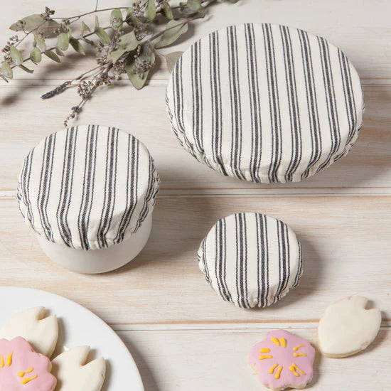 he Ticking Stripe Mini Bowl Covers by Now Designs! This set of three charming covers in beige and gray stripes not only extends the life of your food but also adds a touch of flair to your kitchen. 