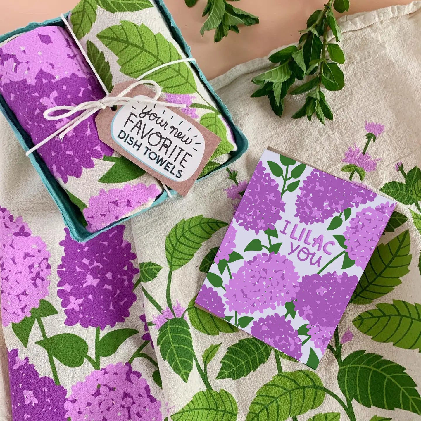 This dish towel gift sets are packaged up ready for gifting! The I Lilac Purple set contains 2 100% cotton, unbleached kitchen towels: Lilac & Mint