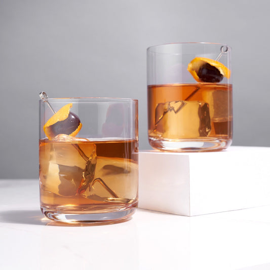 Perfect for an Old Fashioned or neat whiskey alike, the weight and flawless clarity of these whiskey glasses will elevate the experience of savoring your favorite aged spirit. Clean, modern lines add a contemporary feel to the classic rocks glass, enhancing your liquor or cocktail. What better accompaniment to an evening kicked back fireside over an Old Fashioned or single-malt Scotch?