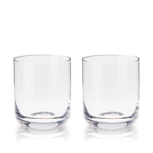 Perfect for an Old Fashioned or neat whiskey alike, the weight and flawless clarity of these whiskey glasses will elevate the experience of savoring your favorite aged spirit. Clean, modern lines add a contemporary feel to the classic rocks glass, enhancing your liquor or cocktail. What better accompaniment to an evening kicked back fireside over an Old Fashioned or single-malt Scotch?