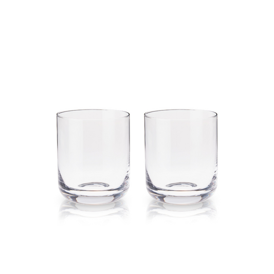 Perfect for an Old Fashioned or neat whiskey alike, the weight and flawless clarity of these whiskey glasses will elevate the experience of savoring your favorite aged spirit. Clean, modern lines add a contemporary feel to the classic rocks glass, enhancing your liquor or cocktail. What better accompaniment to an evening kicked back fireside over an Old Fashioned or single-malt Scotch?