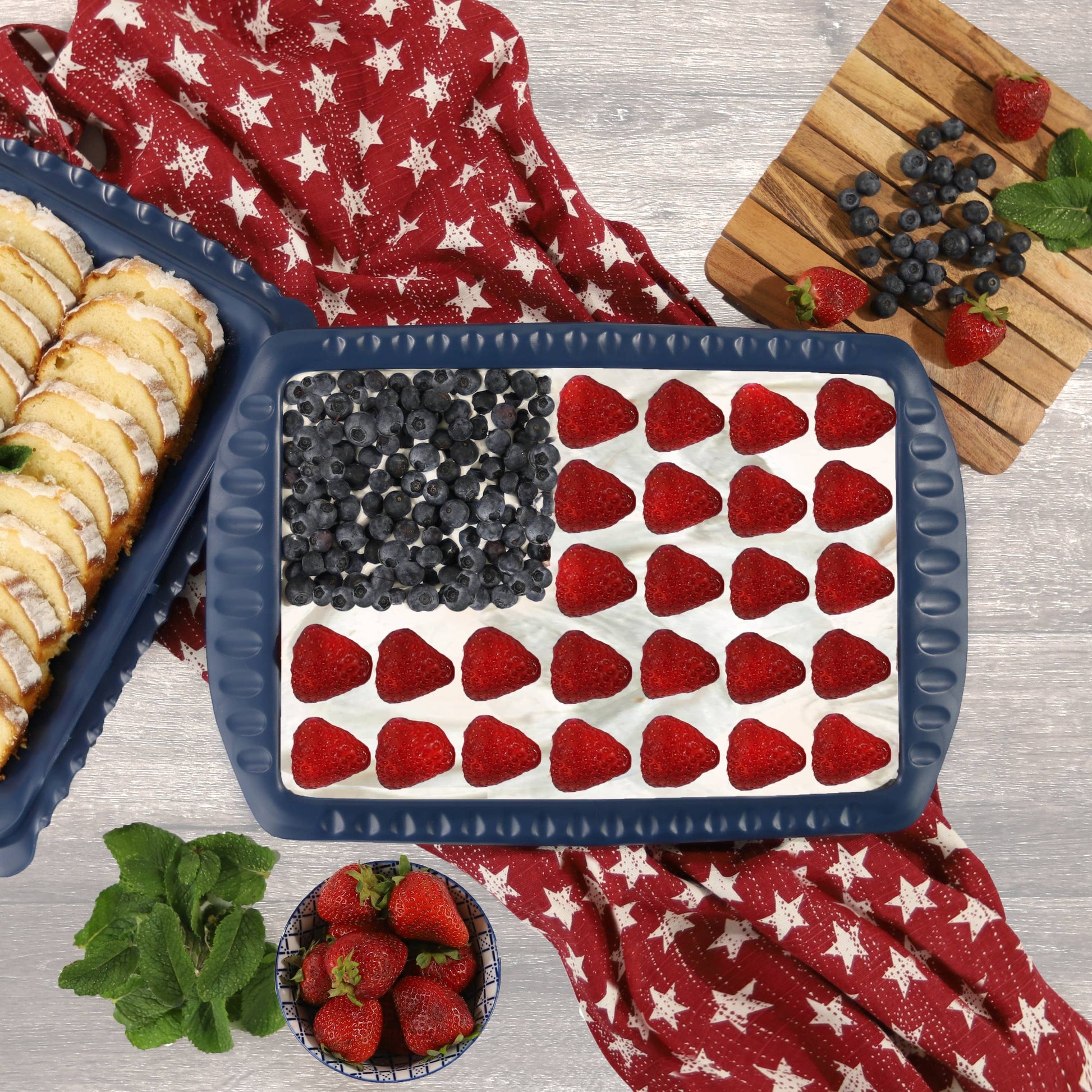 Foil Decor has three plastic components that work as a system to hold a 9x13 foil pan. Shown with a strawberry and blueberry dessert.