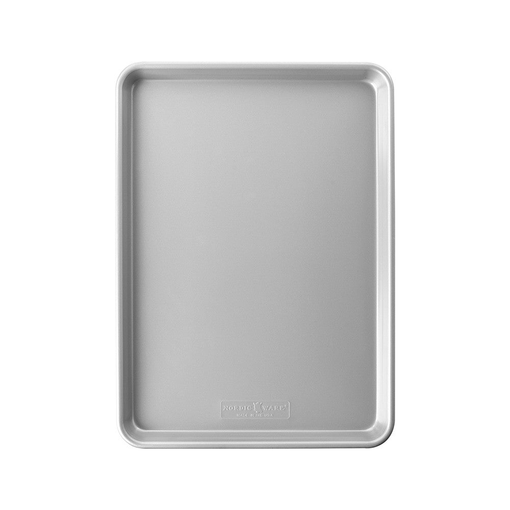 Metal baking tray on a white background