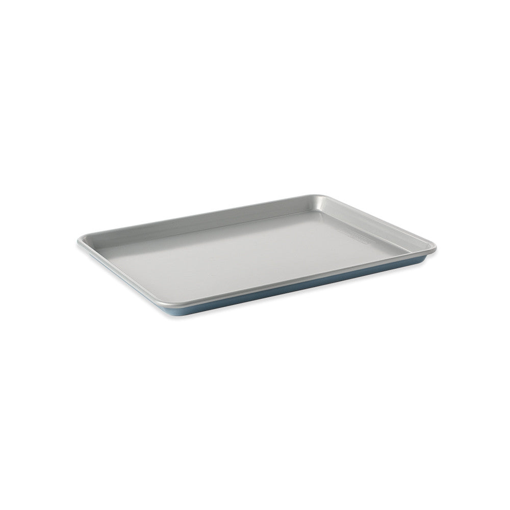 Rectangular baking tray with blue rim on a white background