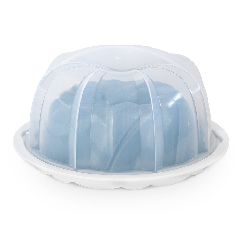 Bundt mold with a clear lid on a white background