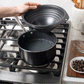 Double Boiler being placed on pot and chocolate added then melted and stirred