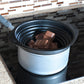 Chocolate bars in a double boiler on a stovetop