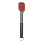 Barbecue brush with red bristle head and black handle on a white background