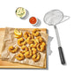 Fried shrimp on a wooden board with a strainer and sauces on a white background