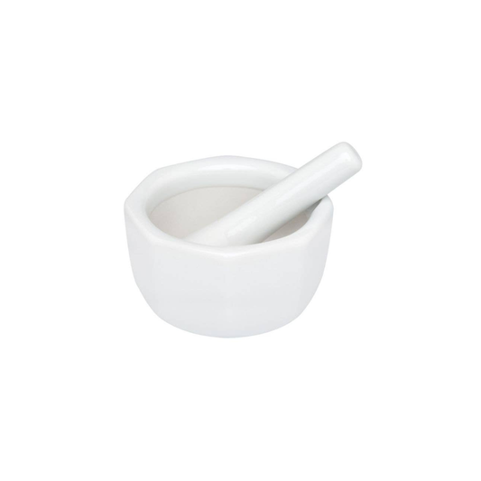White ceramic mortar and pestle on a white background