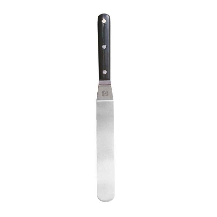 Spatula with black handle on a white background