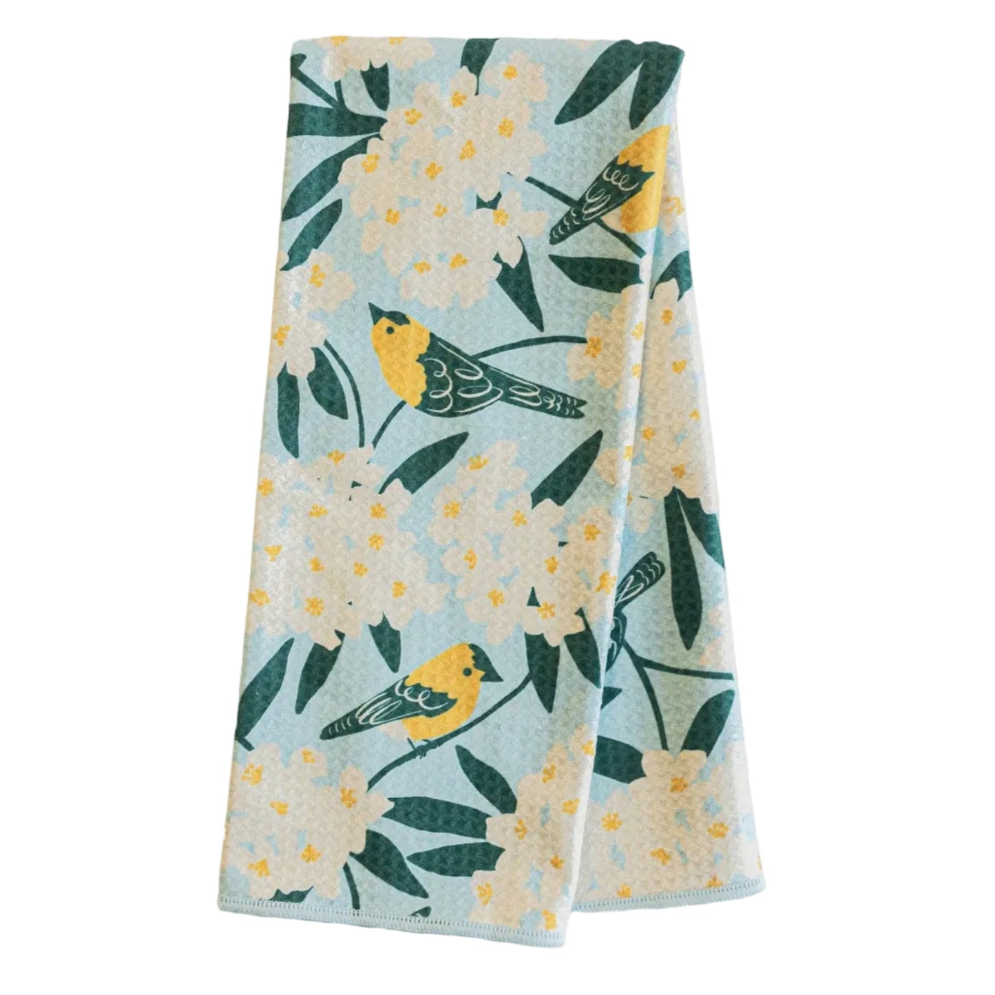 Floral and bird patterned towel on a white background