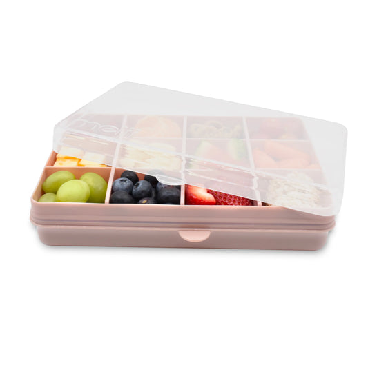 The Snackle Box is the perfect companion for busy parents and adventurous kids who love snacks on the go. Inspired by the design of a tackle box, this innovative snack container features 12 individual compartments, each with removable dividers, creating a customizable storage space for an array of delicious treats.