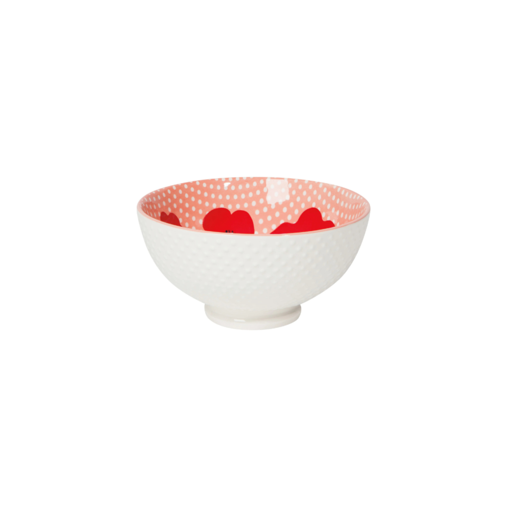 Full to the brim with charm, this Poppy stamped bowl brings pattern and color to the table. Flush with vibrant red and petal pink this pattern is an invitation to pause and appreciate the bold beauty of the Poppy.