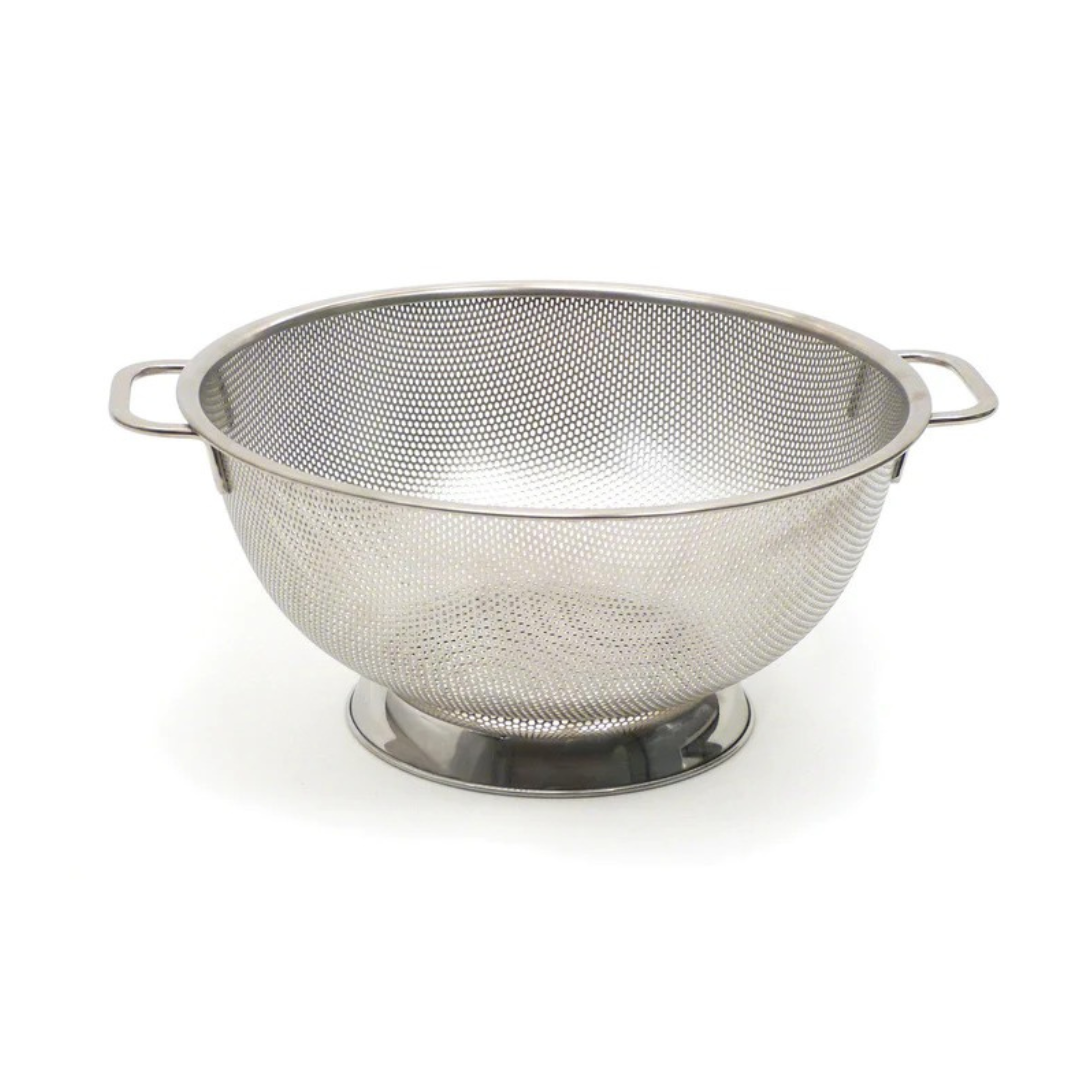 Precision Pierced Colander is an ingenious design, with every inch covered in tiny holes to let every drip and drop escape. Its wide rim base keeps it stable when pouring in hot water and keeps all your ingredients safely inside, up to 5 quarts. Crafted from superior 18-8 stainless steel, it boasts a polished surface that's corrosion-resistant. Even the tiniest of orzo and angel hair noodles won't slip away