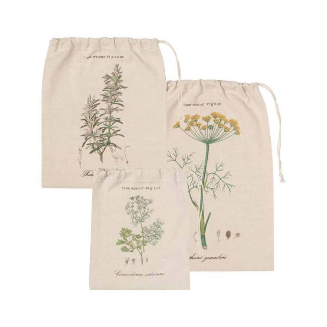  3-Piece Garden Herbs Produce Bags from Now Designs by Danica! These charming, washable bags feature beautiful illustrations of dill, rosemary, and coriander, complete with their fancy Latin names, bringing a touch of rustic charm to your shopping routine.