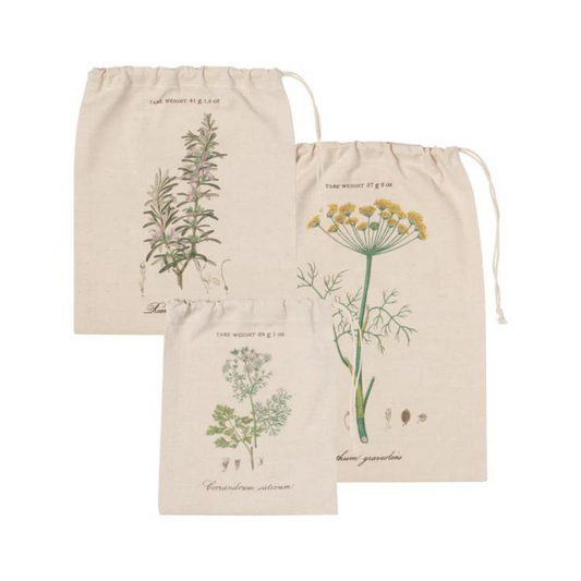  3-Piece Garden Herbs Produce Bags from Now Designs by Danica! These charming, washable bags feature beautiful illustrations of dill, rosemary, and coriander, complete with their fancy Latin names, bringing a touch of rustic charm to your shopping routine.