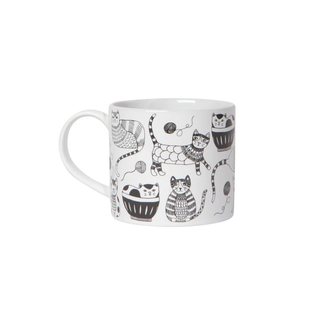 Mug in a Box - Purr Party from Danica Jubilee! This enchanting set features a delightful ceramic mug, adorned with whimsical cat designs that are sure to bring a smile to any feline lover's face. Each 14-ounce stoneware mug comes beautifully packaged in a gift-ready box