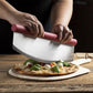 Rocking Pizza Cutter with Blade Guard being used to cut a pizza on a pizza peel. 