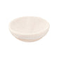 Round woven basket with a white fabric cover on a white background