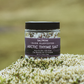 Jar of Saltverk Arctic Thyme Salt on a grassy background