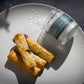 Pastry rolls with flaky sea salt on a plate