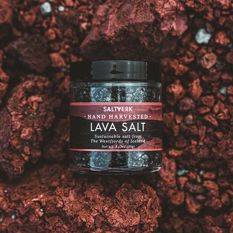 Jar of Saltverk Lava Salt on a textured red background