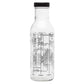 Clear glass bottle with black cap on a white background