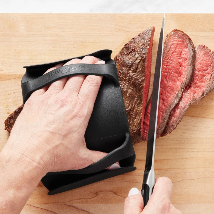 GRIPmitt® is the only cooking mitt you will ever need in the kitchen and at the grill station. This innovative and versatile mitt provides for dexterous, safe and easy handling of hot, cold and raw foods; hot pots and pans while prepping, cooking, grilling, carving and slicing. Hygienically slice breads without using a hand towel and prepare raw meats, poultry and vegetables without bare hands. Slice cooked meats and carve cooked poultry without burning your hands or using a carving fork.