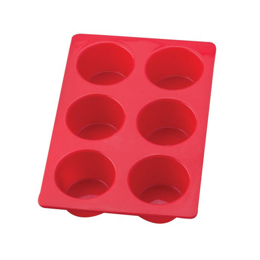 Red silicone muffin tray on a white background