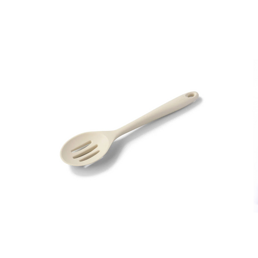 The Silicone Slotted Spoon in Coastal Cream is the ultimate multitasker for your kitchen! Perfect for stirring, straining, and serving, its sculpted head makes cooking effortless. The sturdy nylon core is wrapped in high-quality, non-scratch silicone, keeping your cookware safe while handling high heat up to 482ºF.