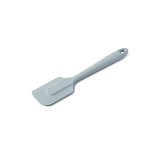 The 10" Coastal Blue Silicone Spatula by Zeal is your go-to kitchen sidekick for stirring, scraping, mixing, and baking with ease. Designed with an ergonomic handle and a handy hanging loop for effortless storage, this spatula features a flexible yet durable non-scratch silicone head that’s safe for all non-stick surfaces.