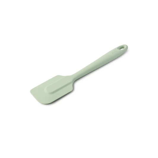 The 10" Coastal Green Silicone Spatula by Zeal is your go-to kitchen sidekick for stirring, scraping, mixing, and baking with ease. Designed with an ergonomic handle and a handy hanging loop for effortless storage, this spatula features a flexible yet durable non-scratch silicone head that’s safe for all non-stick surfaces.