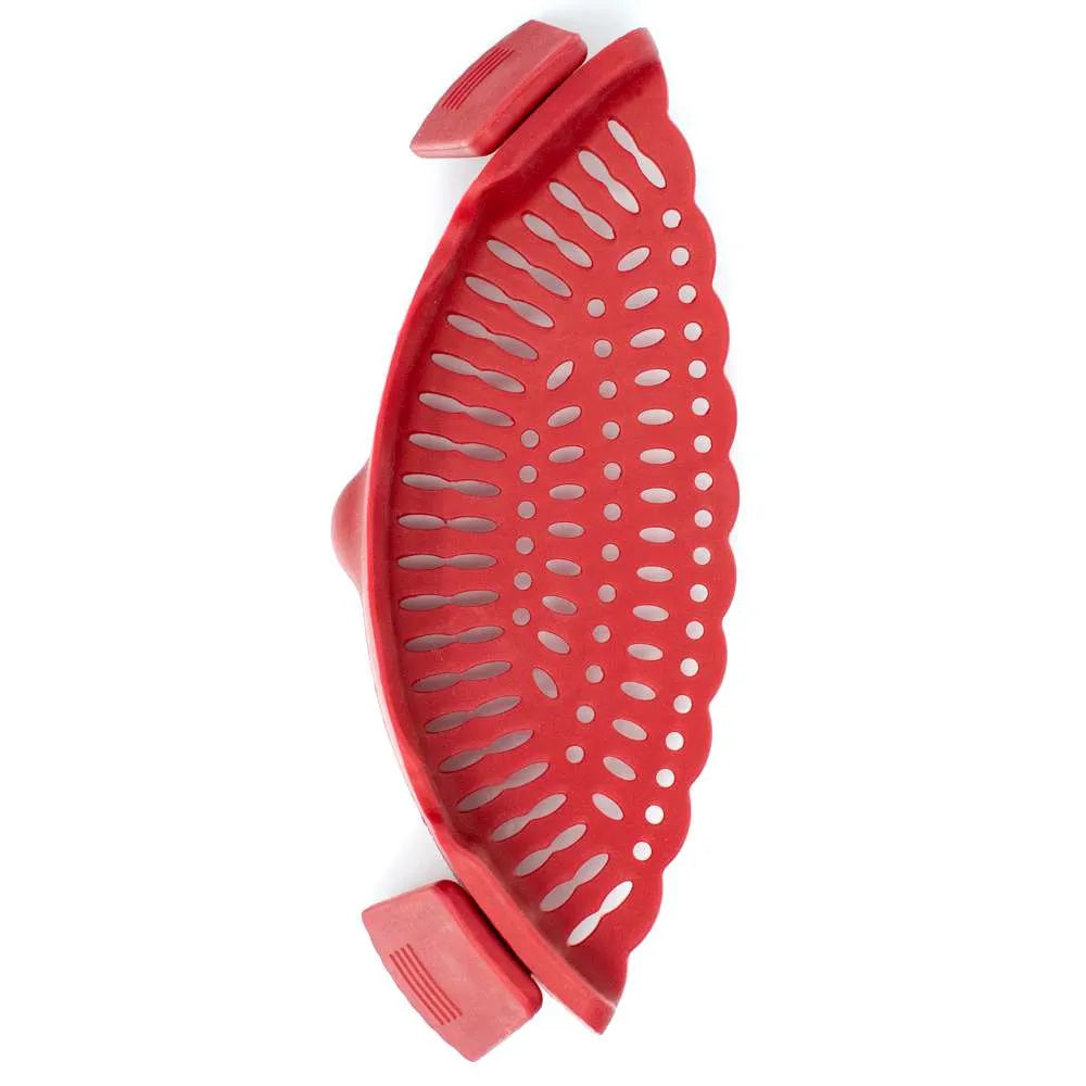 A red silicone kitchen strainer basket with scalloped edges and multiple oval drainage holes, shown on a plain white background.