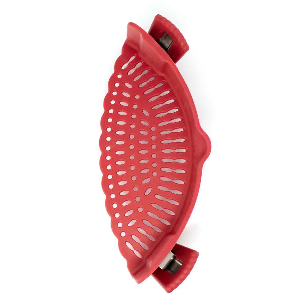 Red silicone strainer on a white background